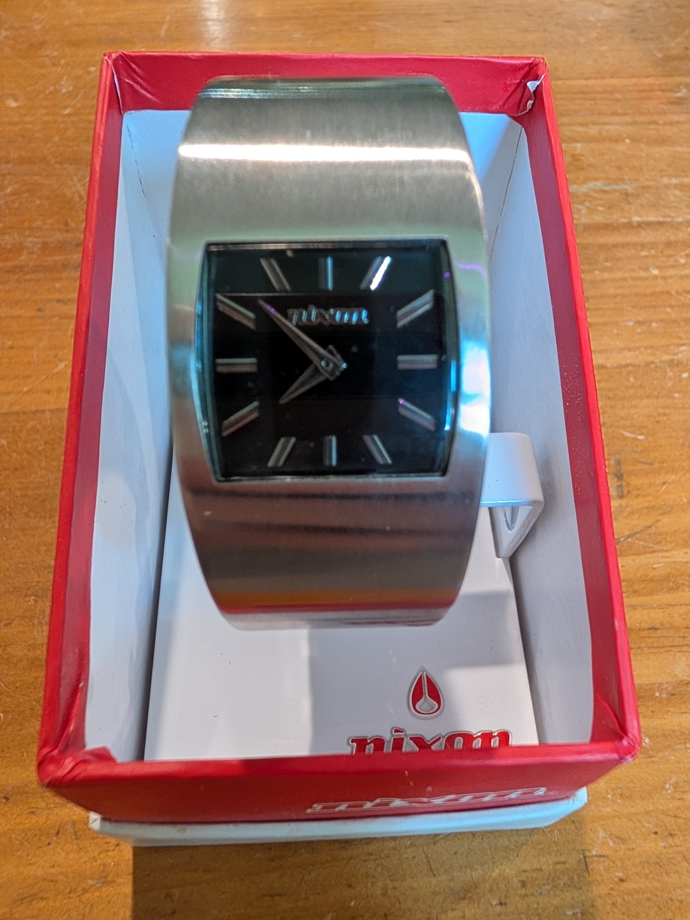 Nixon Cleo Silver Cuff Watch with Black Dial